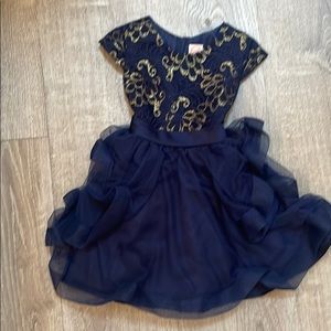 Girls’ size 5 formal dress. Blue/gold. Tie back.